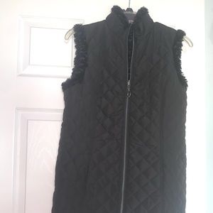 All Black vest with a furry black interior size small